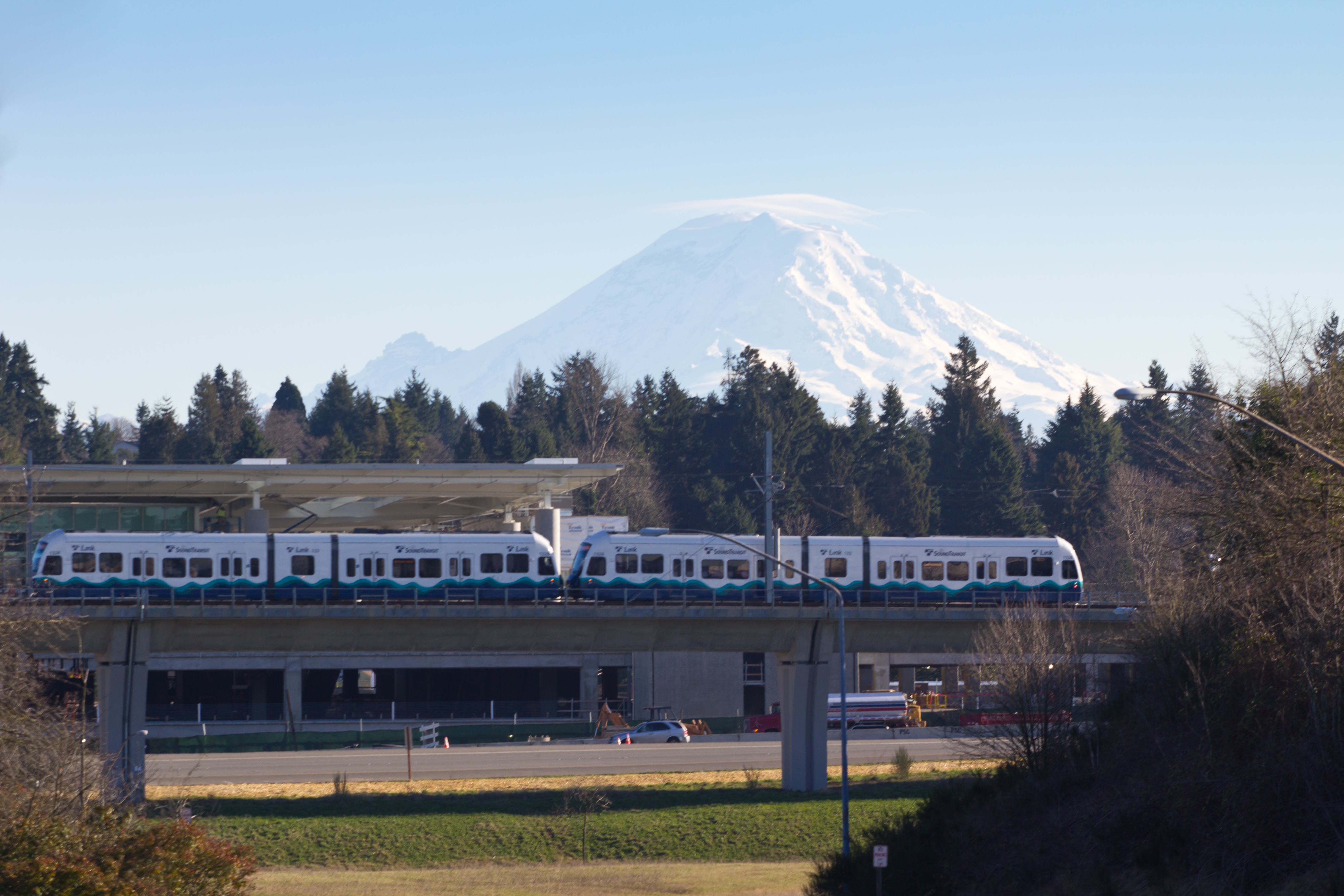 Link light rail train with Mount Rainier visible near SeaTac and Tukwila, Washington